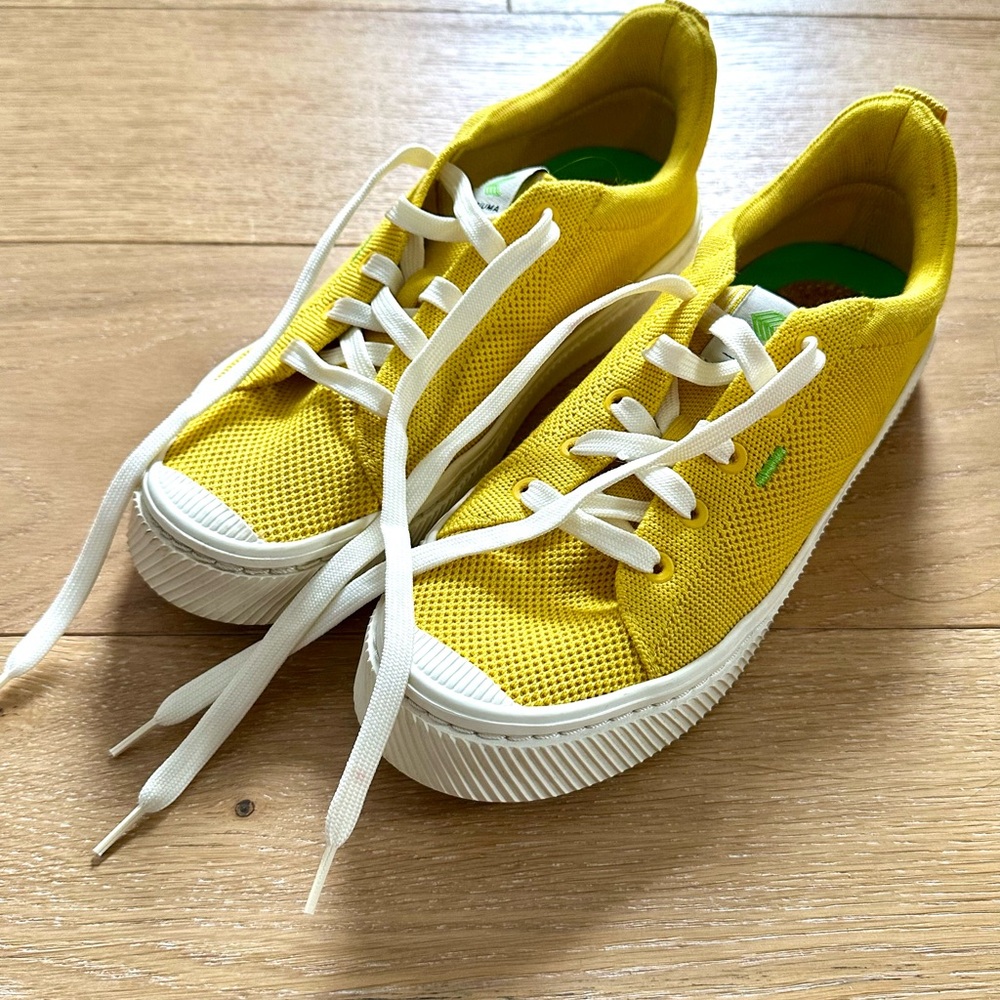 Bright yellow women’s Cariuma sneakers
